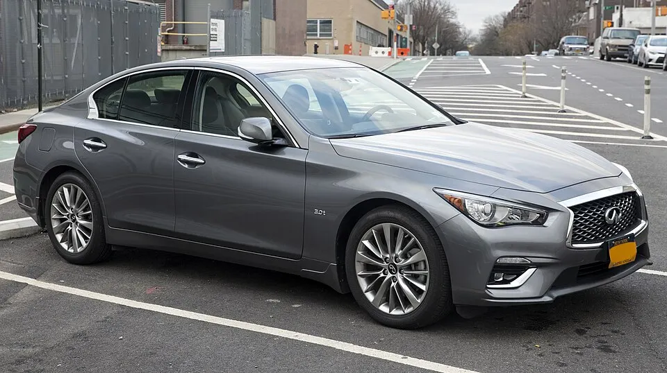 2019 Infiniti Q50 3.0t Luxe AWD in Graphite Shadow, front right, photographed in United States
