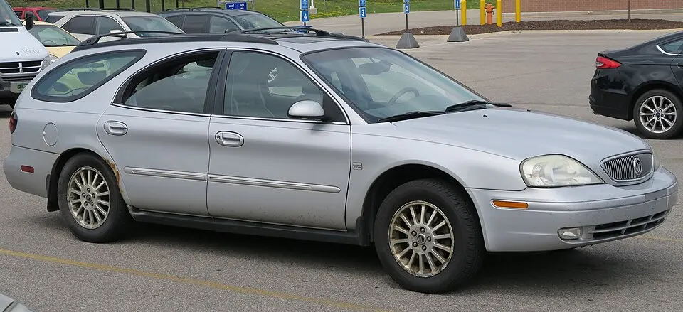 2003 Mercury Sable LS Platinum Edition in Silver Frost Clearcoat Metallic, Front Right, 08-06-2022, photographed in United States