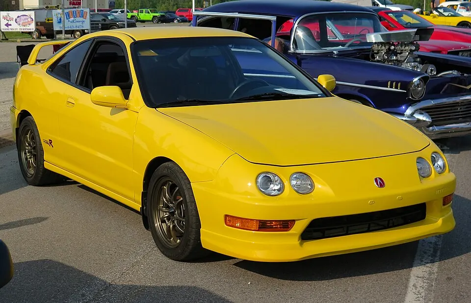2001 Acura Integra Type-R in Phoenix Yellow, Front Right (St. Ignace 2023), photographed in United States