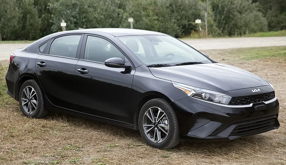 2022 Kia Forte LXS in Aurora Black Pearl, front right, photographed in United States
