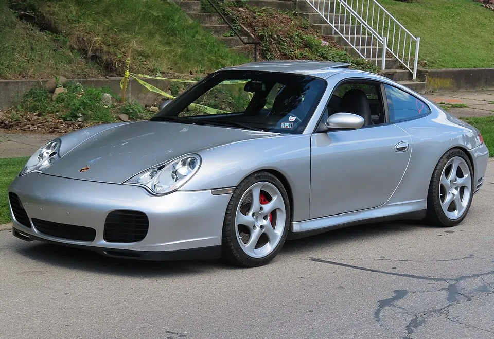 2003 Porsche 911 Carrera 4S coupe, front left, 06-08-2024, photographed in United States
