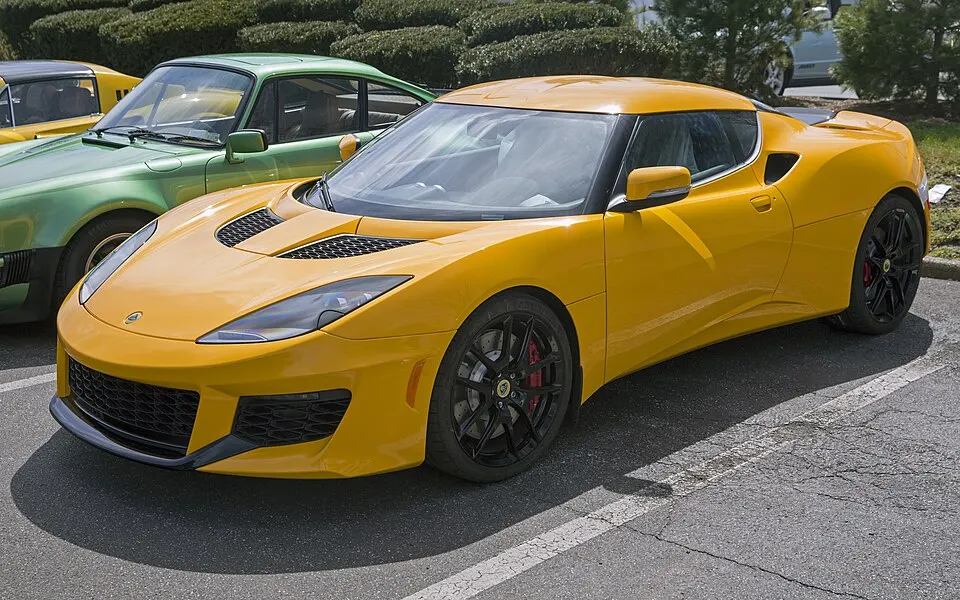 2018 Lotus Evora 400 in yellow, front left, photographed in United States