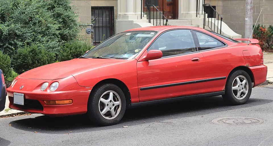 1999 Acura Integra SE in Milano Red, front left, 07-06-2026, photographed in United States