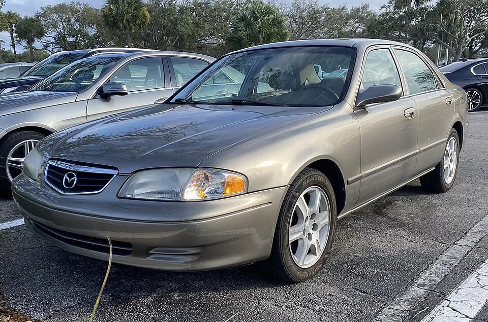 2002 Mazda 626 ES V6 in Driftwood Mica, front left, 01-17-2024, photographed in United States