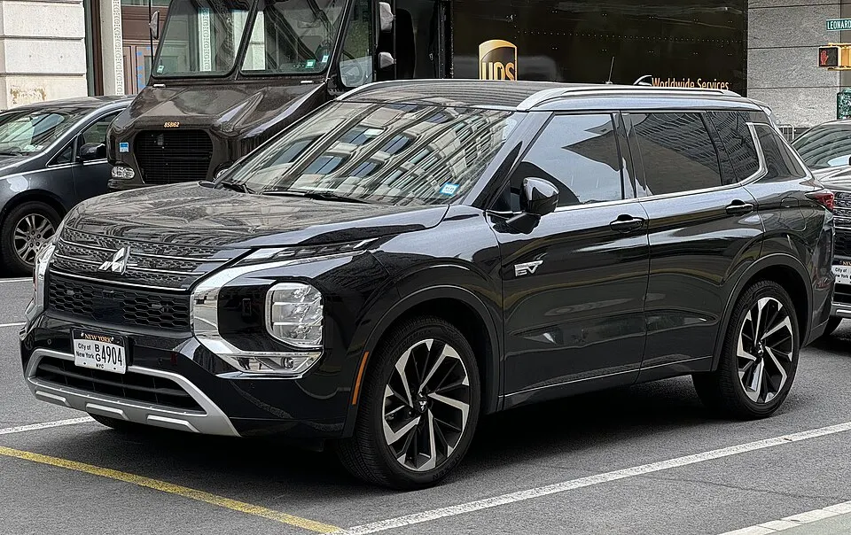 2023 Mitsubishi Outlander PHEV SEL in Jet Black Mica, front left (NYC), photographed in United States