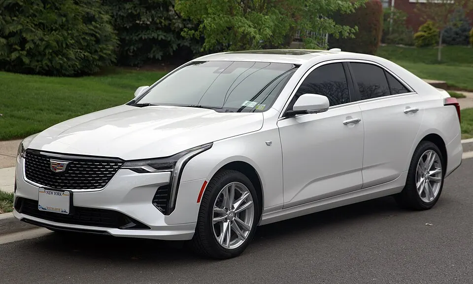 2023 Cadillac CT4 Luxury+ in Summit White, front left, photographed in United States