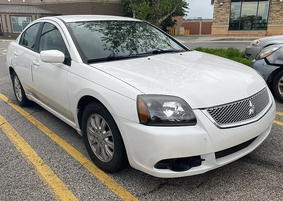 2011 Mitsubishi Galant FE in White Pearl, front right, 05-27-2022, photographed in United States