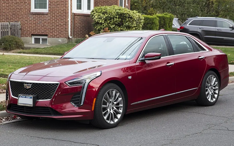 2020 Cadillac CT6 Luxury (3.6 AWD) in Red Horizon Tintcoat, front left, photographed in United States