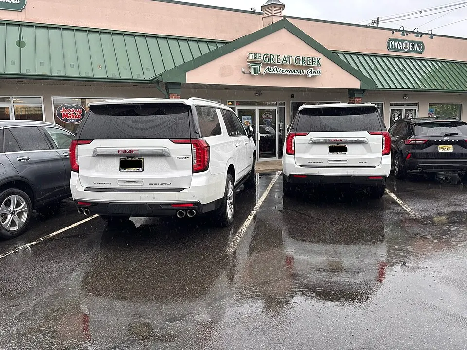 GMC Yukon XLs, photographed in United States