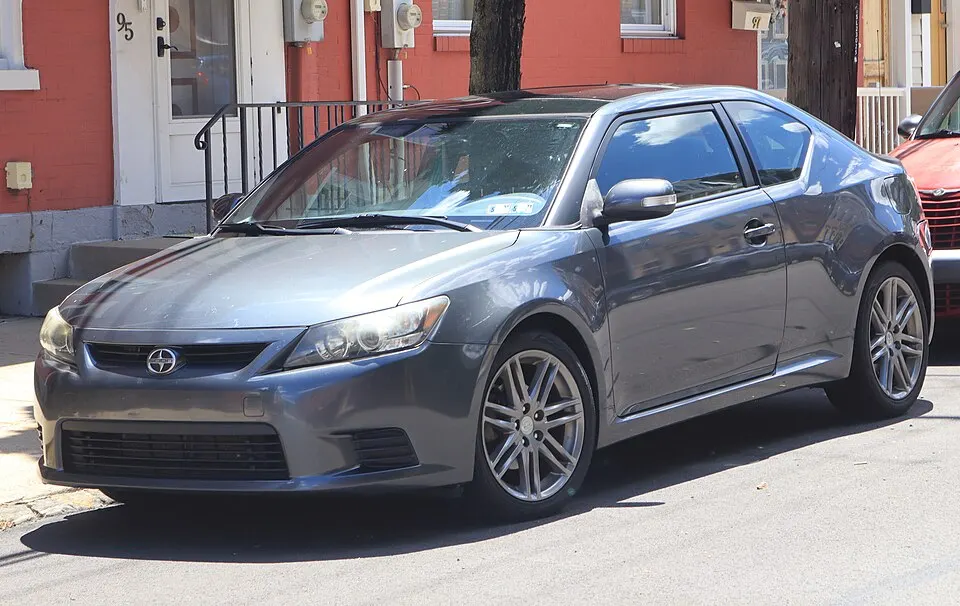 2013 Scion tC in Magnetic Gray Metallic, front left, 06-13-2026, photographed in United States