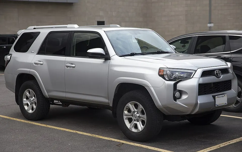 2015 Toyota 4Runner SR5 4WD in Classic Silver Metallic, front right, photographed in United States