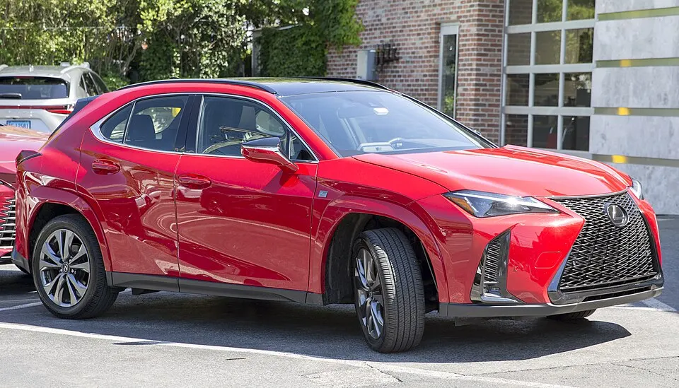 2024 Lexus UX 250h F Sport Design in Redline, front right, photographed in United States