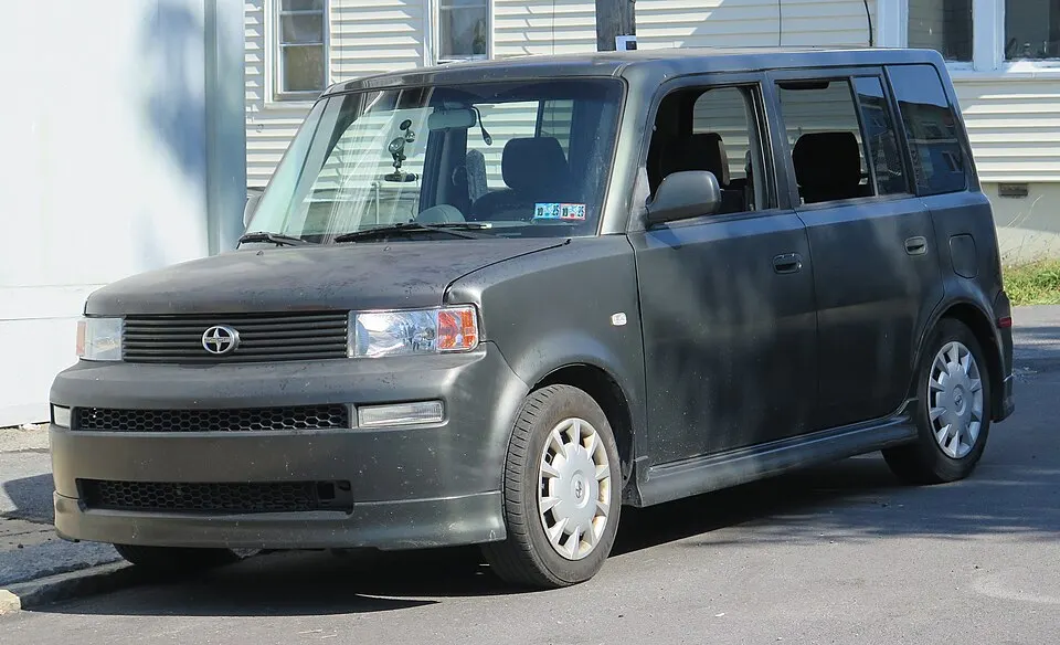 2004 Scion xB in Camouflage, front left, 09-20-2025, photographed in United States