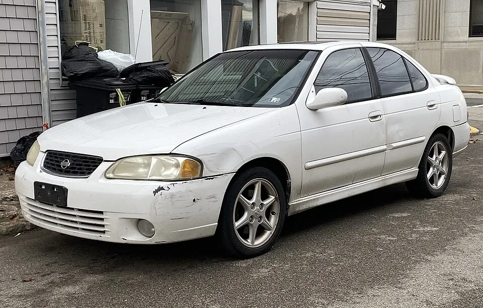 2001 Nissan Sentra in Cloud White, front left, 12-29-2024, photographed in United States