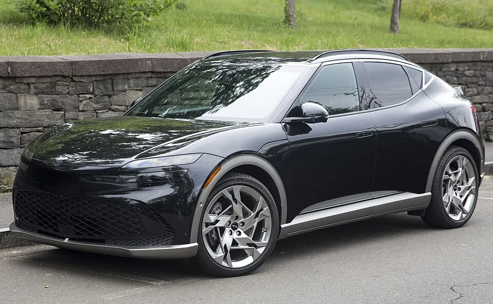 2023 Genesis GV60 Performance in Vik Black, front left, photographed in United States