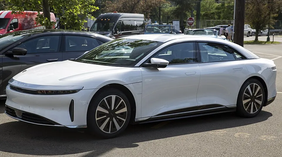 2024 Lucid Air Pure in Stellar White, front left, photographed in United States