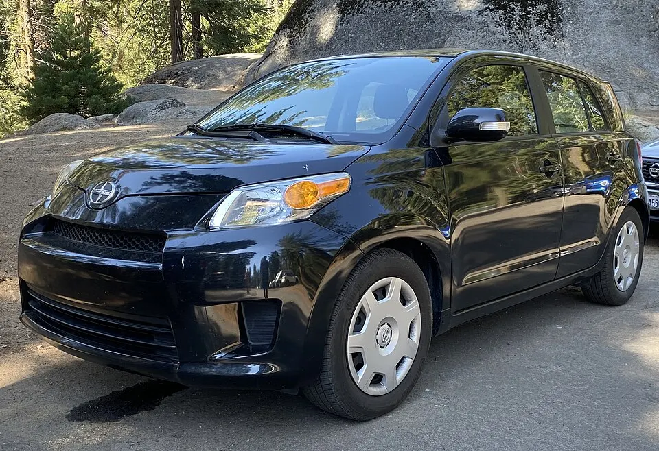 2013 Scion xD in Black Pearl Metallic, front left, 08-10-2022, photographed in United States