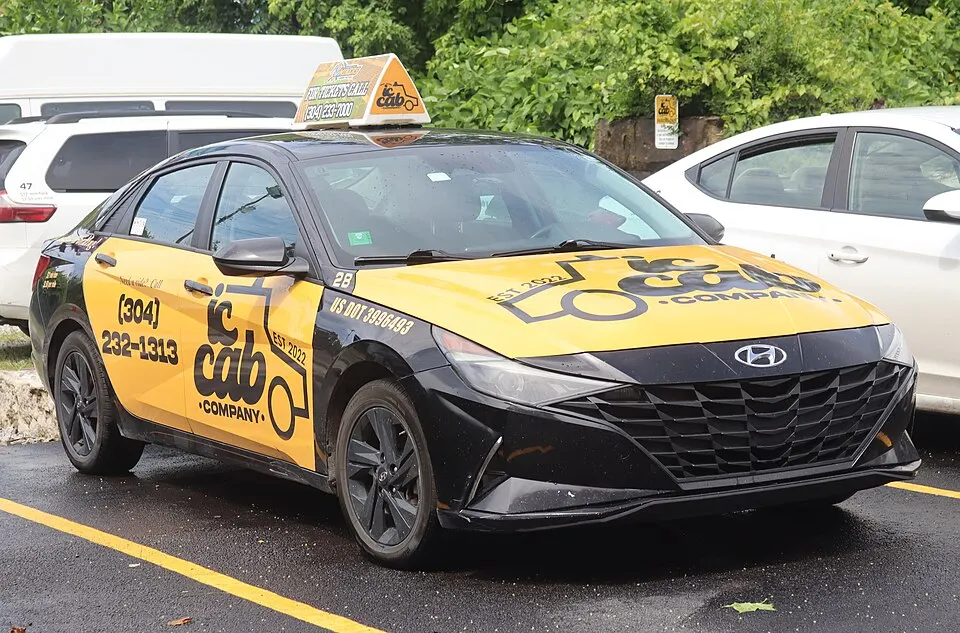 2023 Hyundai Elantra Hybrid Blue taxicab, front right, 06-06-2026, photographed in United States