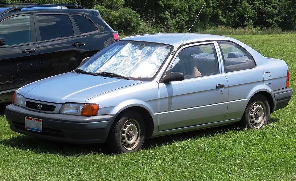 1995 Toyota Tercel 2-door sedan, front left, 07-14-2023, photographed in United States