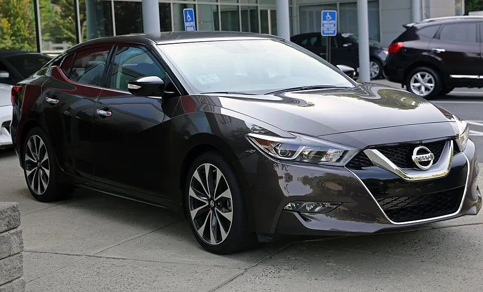 2016 Nissan Maxima SR, Forged Bronze, front right, photographed in United States