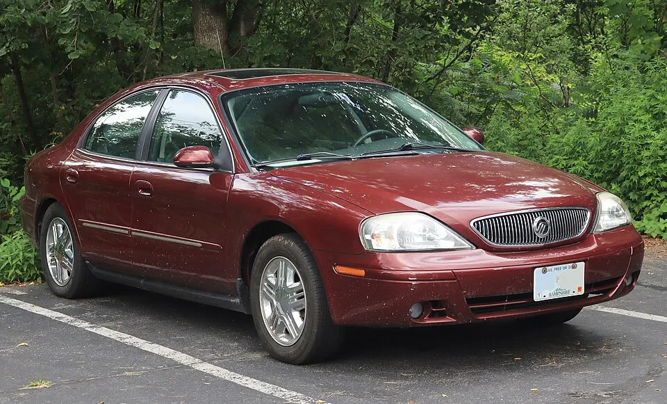 2004 Mercury Sable LS Premium in Merlot Red Metallic, front right, 07-10-2026, photographed in United States