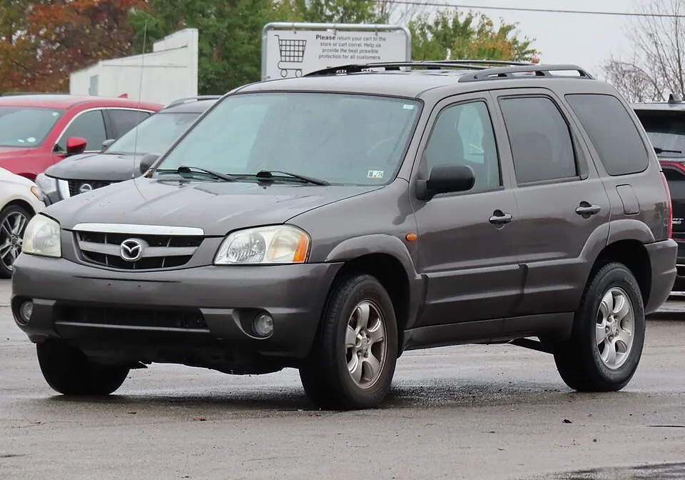 2004 Mazda Tribute LX-V6, front left, 10-29-2023, photographed in United States