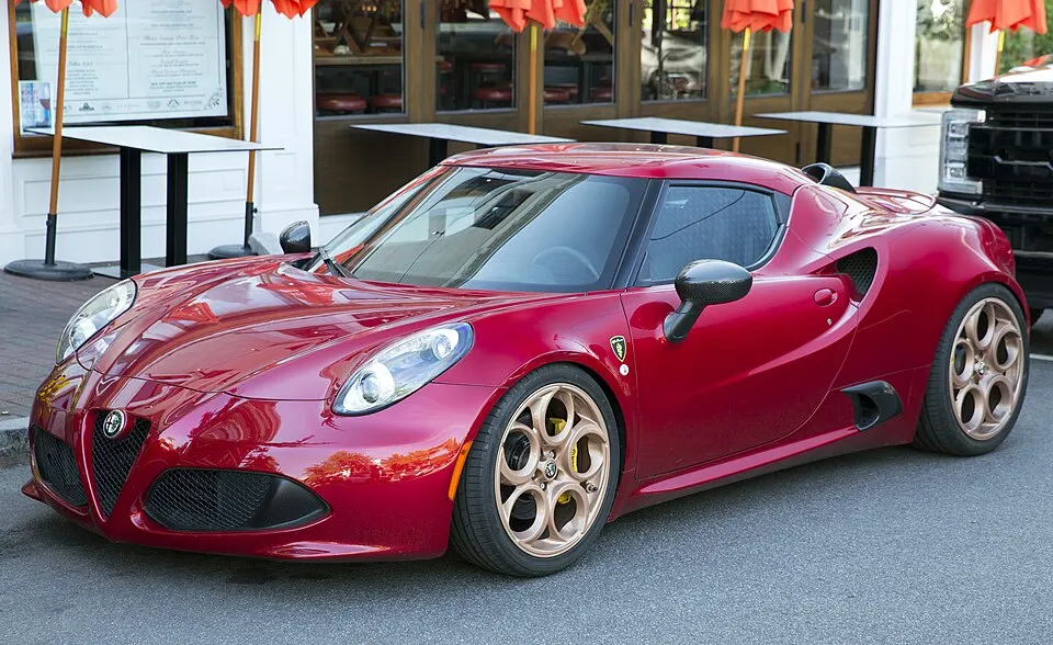 2015 Alfa Romeo 4C Coupé in Rosso Competizione, front left, photographed in United States