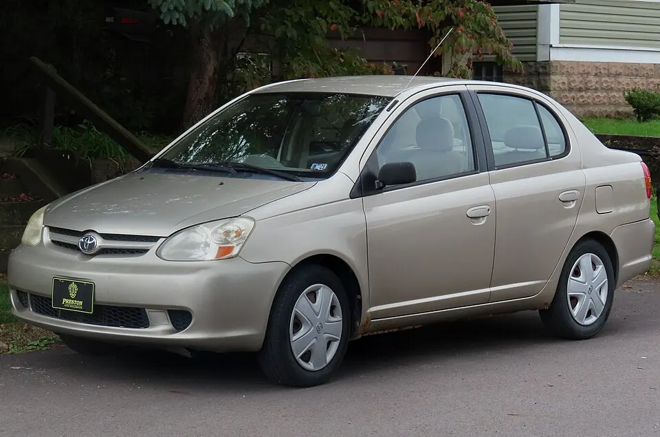 2003 Toyota Echo 4-Door, front left, 09-24-2022, photographed in United States