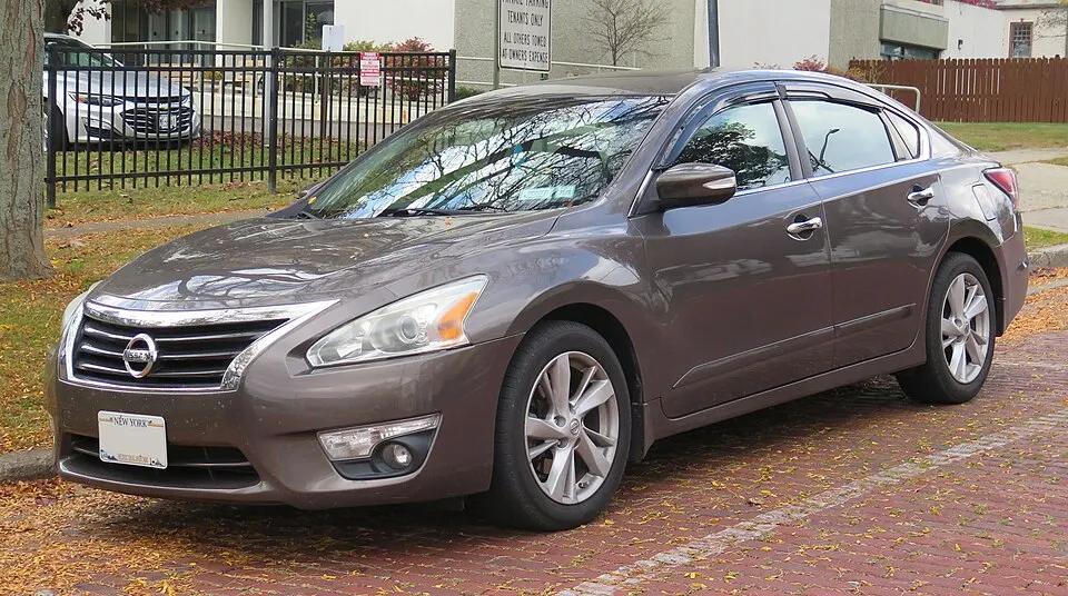 2015 Nissan Altima in Java Metallic, front left, 10-11-2025, photographed in United States