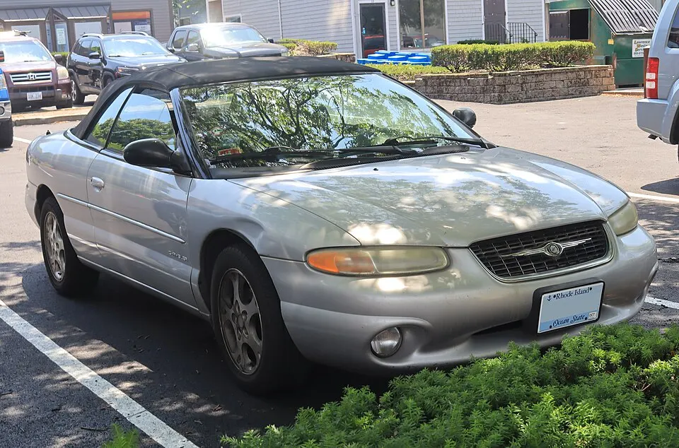 2000 Chrysler Sebring JXi Limited convertible in Bright Silver Metallic, front left, 07-04-2026, photographed in United States