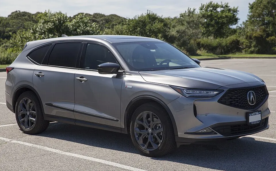 2023 Acura MDX SH-AWD A-Spec in Liquid Carbon Metallic, front right, photographed in United States