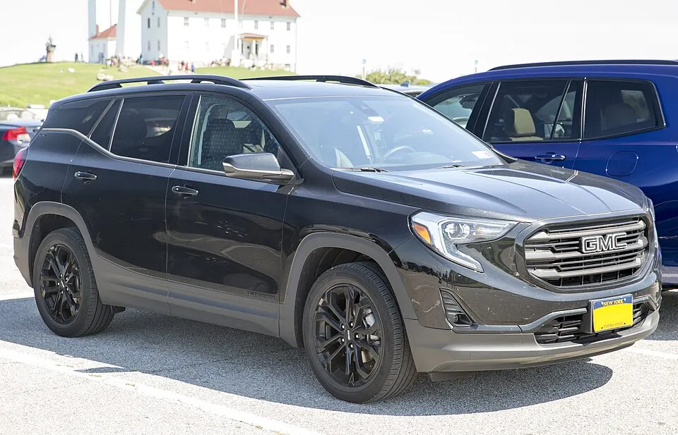 2021 GMC Terrain SLT AWD in Ebony Twilight Metallic, front right, photographed in United States