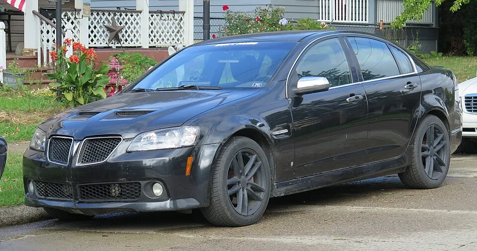 2009 Pontiac G8 GT in Panther Black Metallic, front left, 10-12-2025, photographed in United States