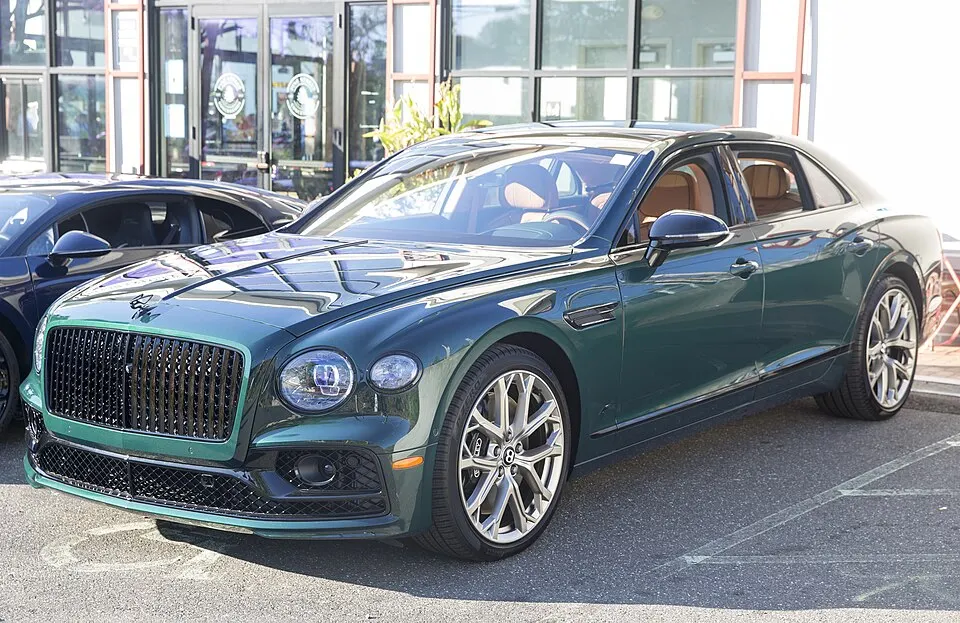 2023 Bentley Flying Spur S V8 in Viridian, front left, photographed in United States