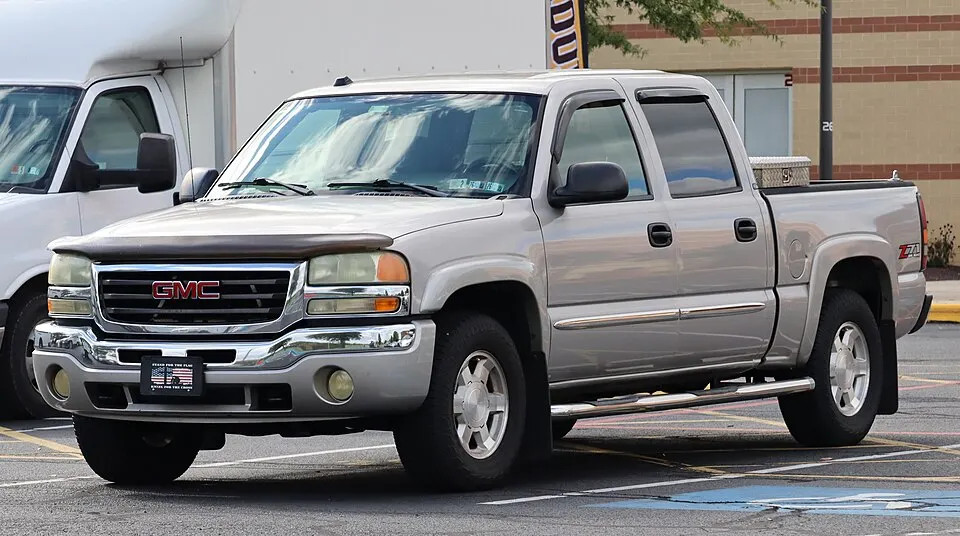 2004 GMC Sierra 1500 SLE Crew Cab in Silver Birch Metallic, front left, 09-18-2026, photographed in United States