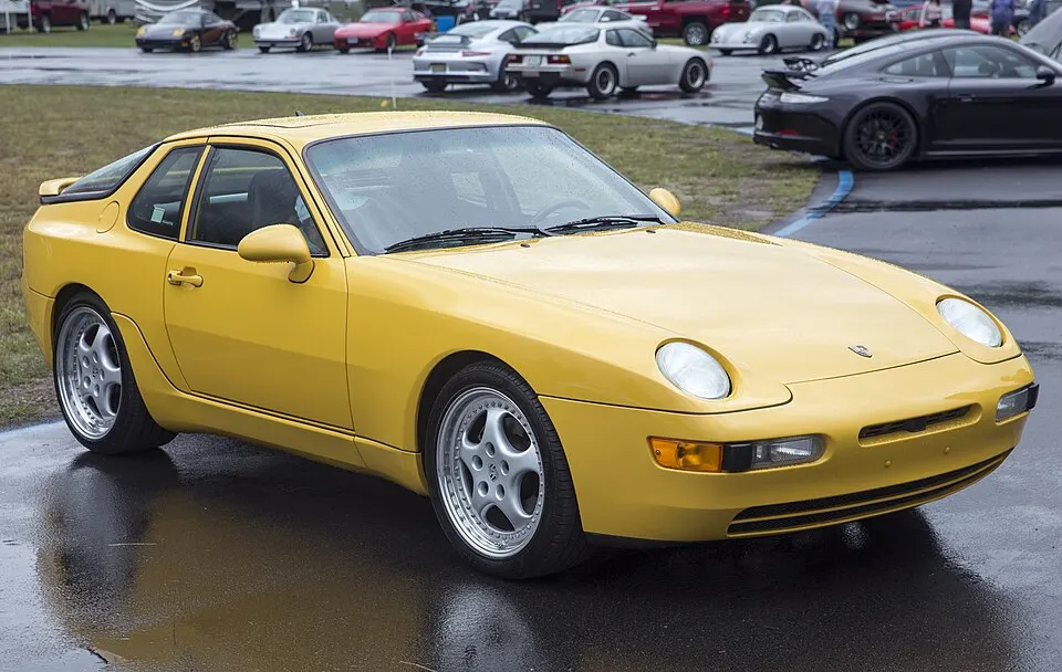1995 Porsche 968 Coupé in Speed Yellow, front right, photographed in United States