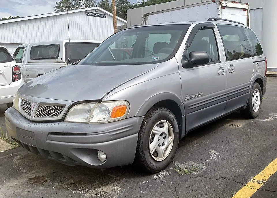 2004 Pontiac Montana 1SA in Liquid Silver Metallic, front left, 07-09-2023, photographed in United States