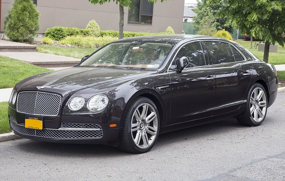 2016 Bentley Flying Spur W12 in Arabica Metallic, front left, photographed in United States
