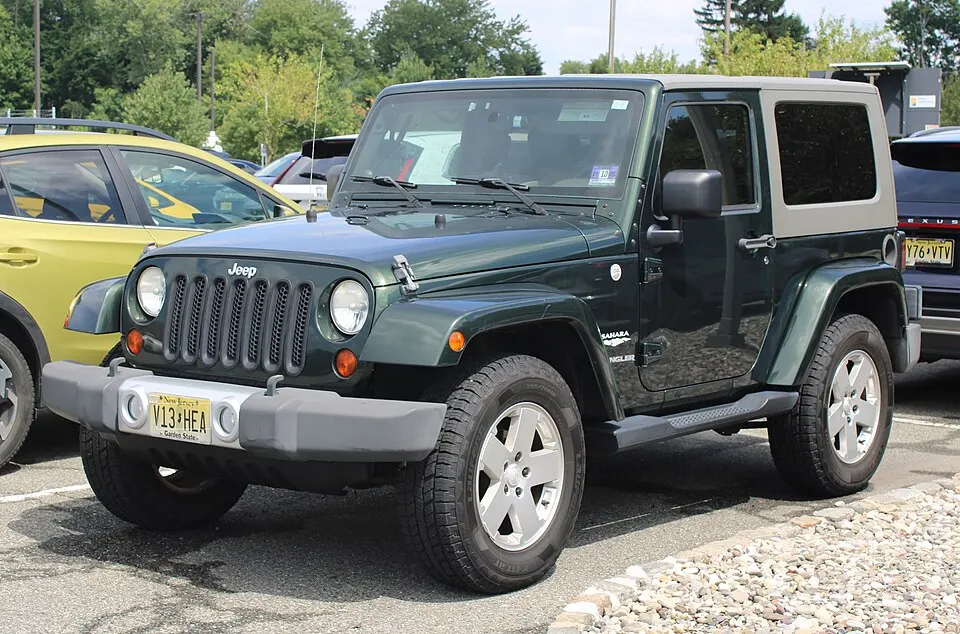 2010 Jeep Wrangler Sahara 4WD, front left, 08-21-2026, photographed in United States