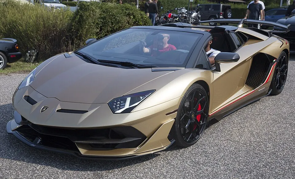2020 Lamborghini Aventador SVJ Roadster in Oro Elios Metallic, front left, photographed in United States