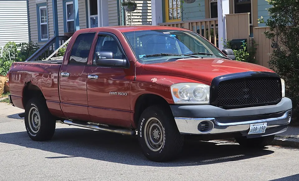 2007 Dodge Ram 1500 SLT in Inferno Red Crystal Pearlcoat, front right, 07-04-2026, photographed in United States
