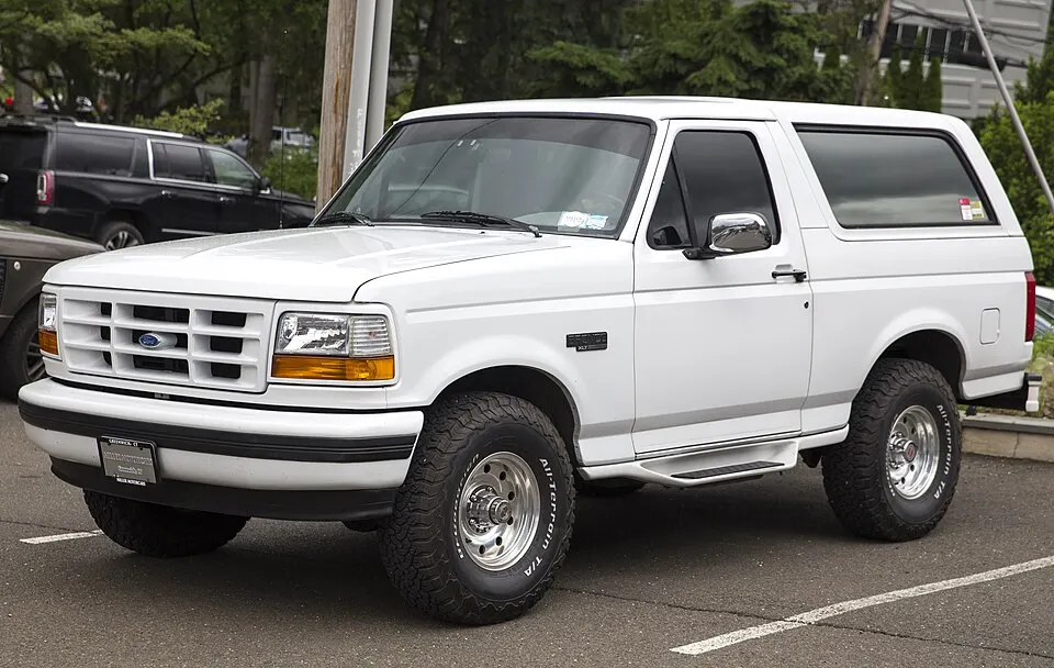 1996 Ford Bronco XLT in Oxford White, front left, photographed in United States