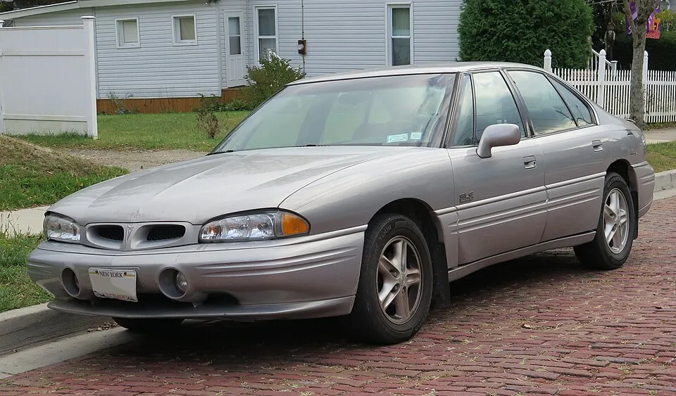 1998 Pontiac Bonneville in Galaxy Silver Metallic, front left, 10-11-2025, photographed in United States