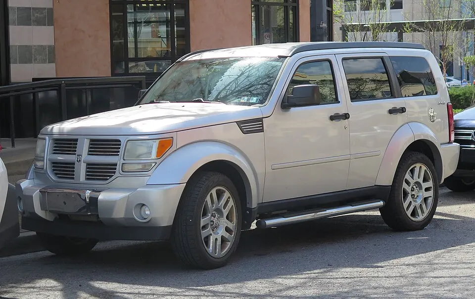 2011 Dodge Nitro Heat in Bright Silver Metallic, front left, 04-04-2026, photographed in United States
