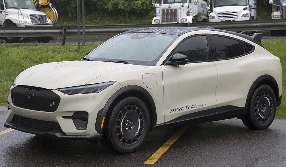 2025 Ford Mustang Mach-E Rally in Desert Sand, front left, photographed in United States