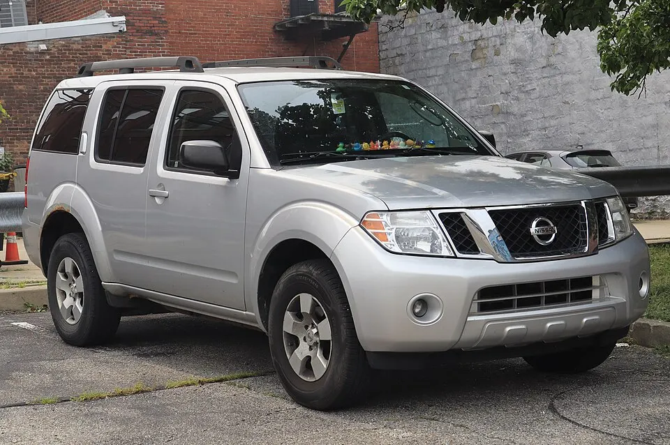 2011 Nissan Pathfinder S in Silver Lightning Metallic, front right, 07-17-2026, photographed in United States