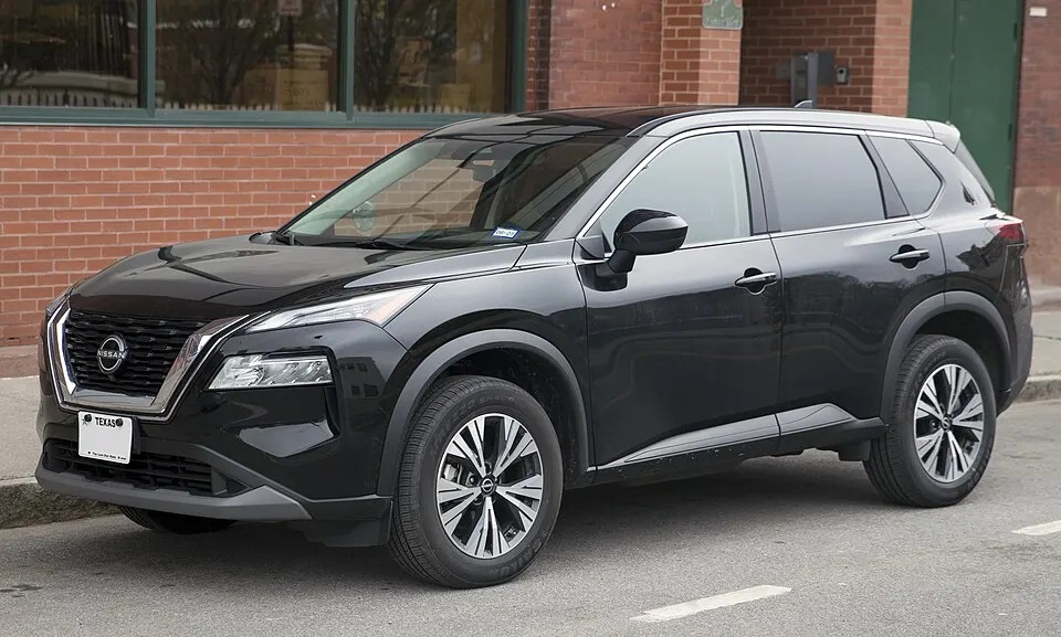 2023 Nissan Rogue SV in Super Black, front left, photographed in United States