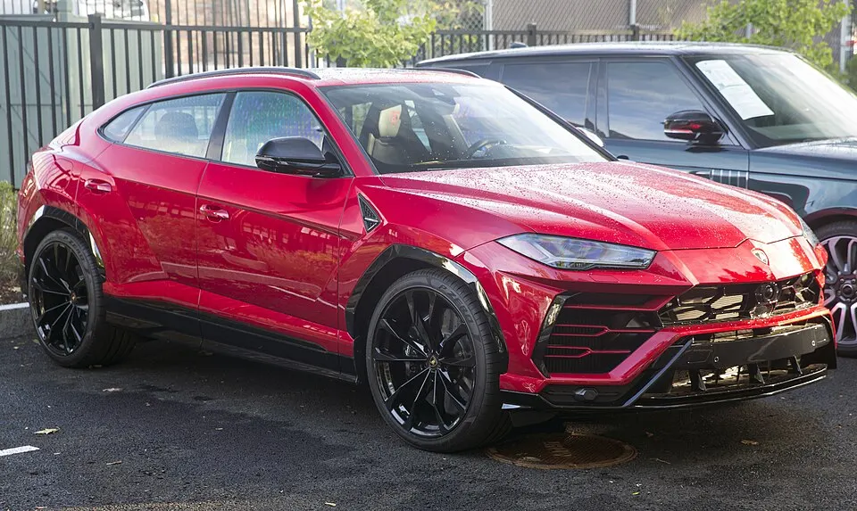2021 Lamborghini Urus in Rosso Efesto, front right, photographed in United States