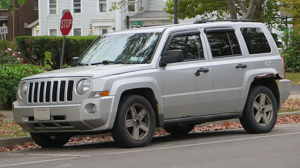 2010 Jeep Patriot in Bright Silver Metallic Clearcoat, front left, 10-11-2025, photographed in United States