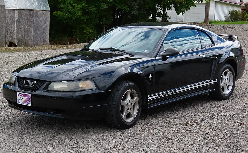 2001 Ford Mustang Coupe with Premium Equipment Group, front left (2022 Ellwood City Fall Fest & Car Cruise), photographed in United States